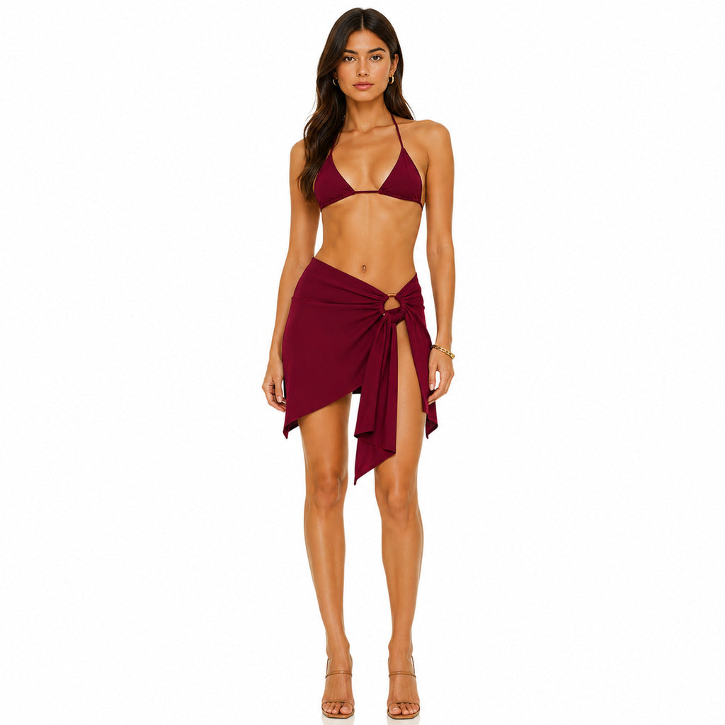 The Attico – burgundy mini skirt with bow detail – front view worn with matching bikini