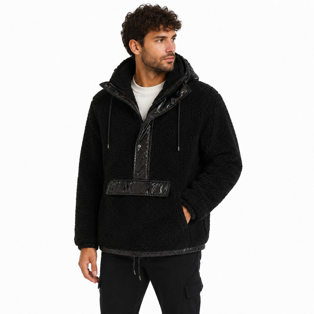Moose Knuckles – black sherpa jacket with hood – front view worn by male model