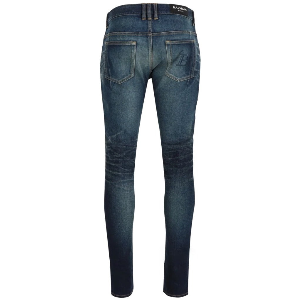 Balmain – blue cotton skinny jeans – rear view with logo patch and back pockets