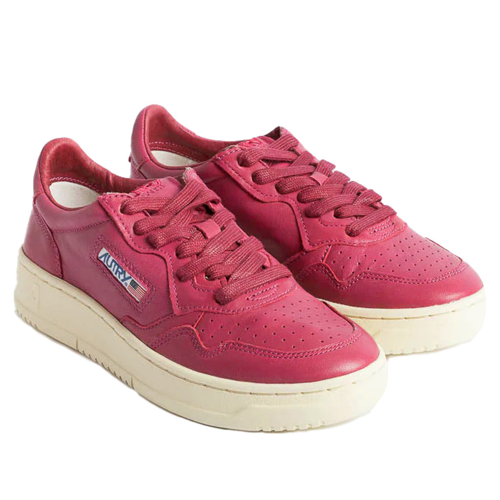 Autry – Dallas sneakers – Fuchsia pair in angled view showing perforated toes and laces
