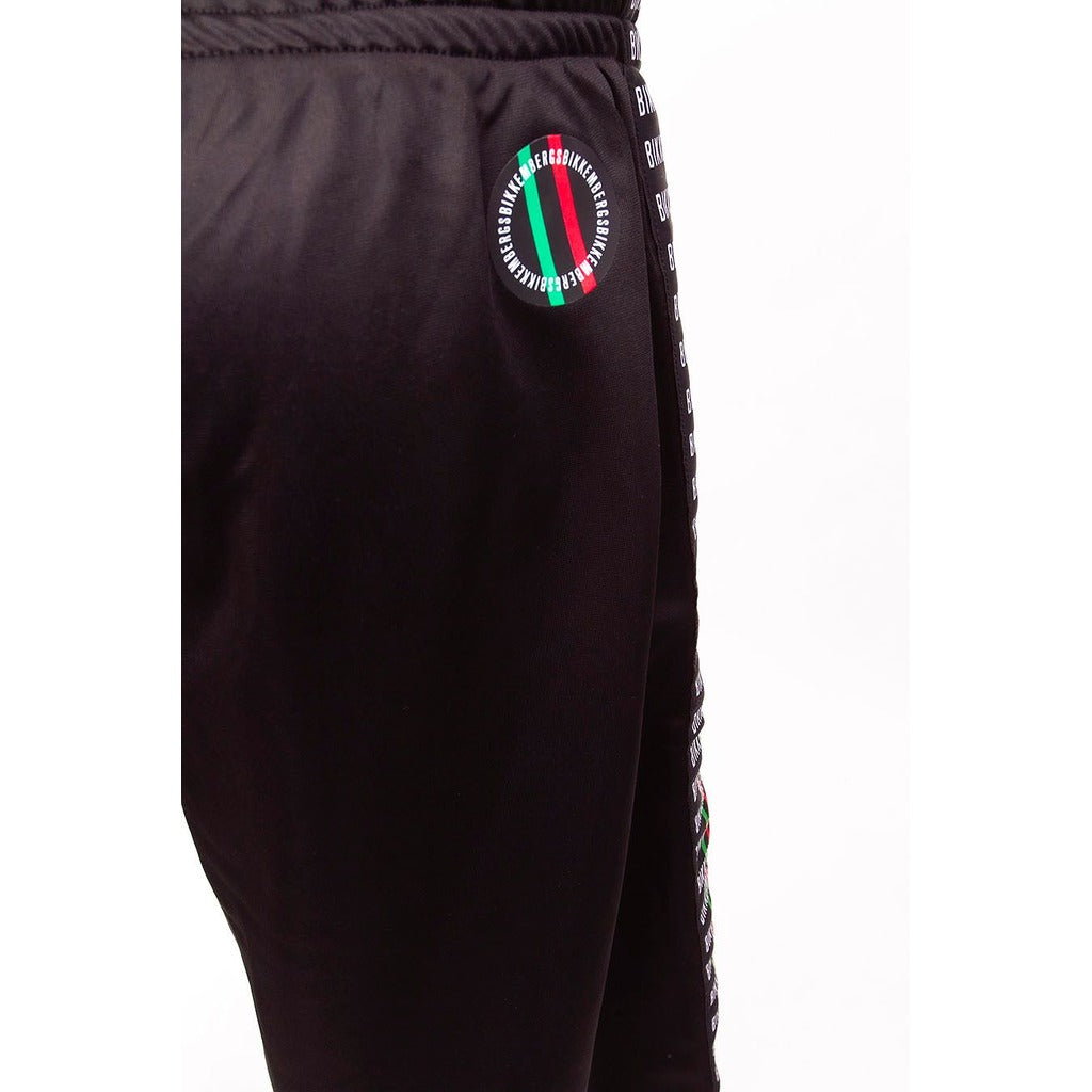 Bikkembergs – C111880_M4109-C74 Technical Shorts – close-up of circular logo and waistband