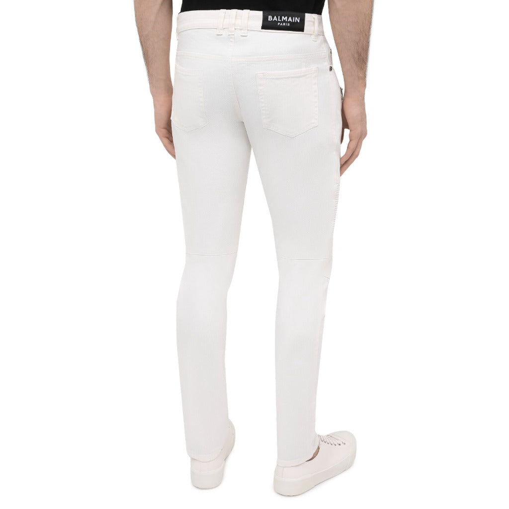 Balmain – white slim-fit jeans – rear view showing back pockets and waistband label