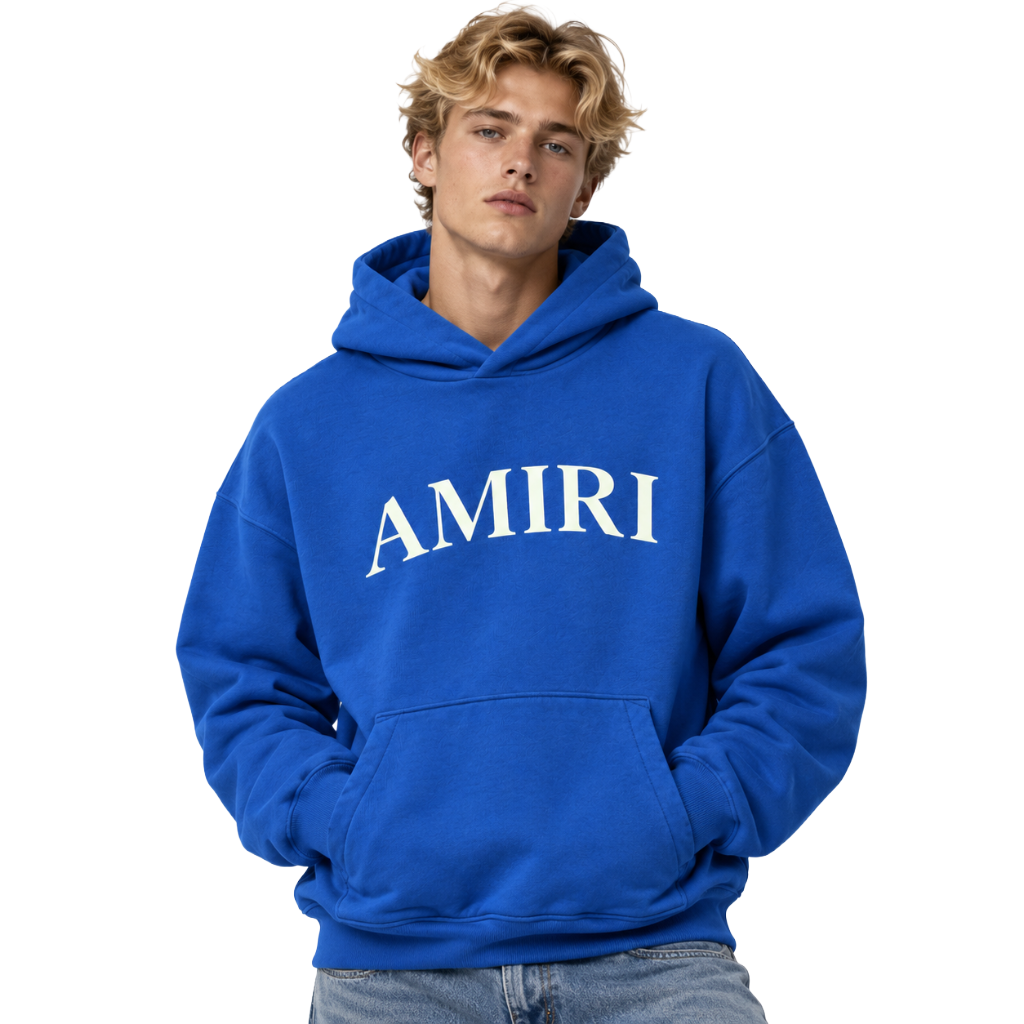 amiri – Logo Hoodie in Blue – model wearing front view with white logo